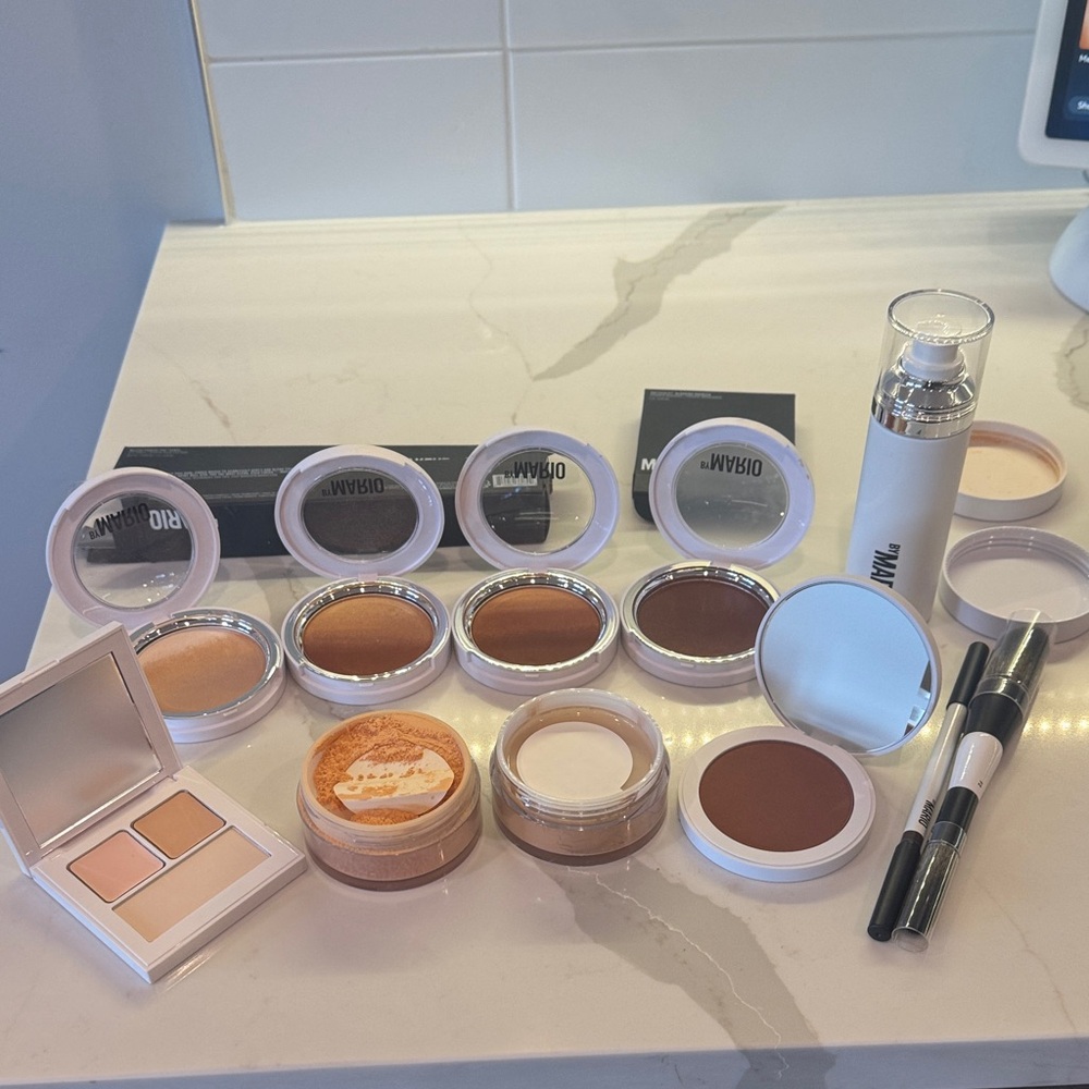 NWOT Makeup Set with highlighter, bronzer, Powder, and Eye prep, eyeliner